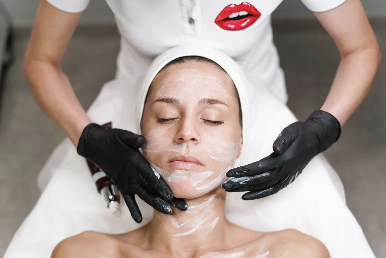 Medical-grade facial treatment with gloved provider