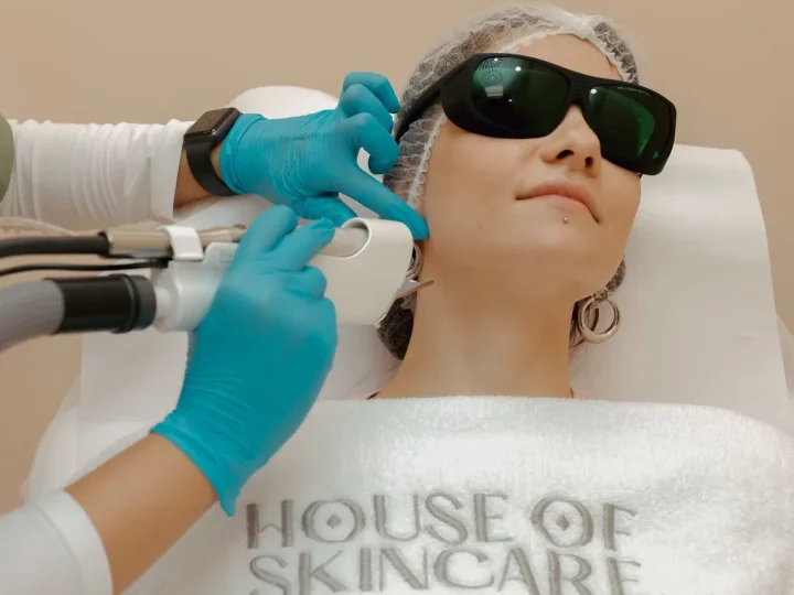 Laser hair removal treatment with protective eyewear