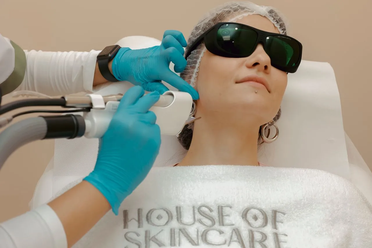 Laser hair removal treatment with protective eyewear